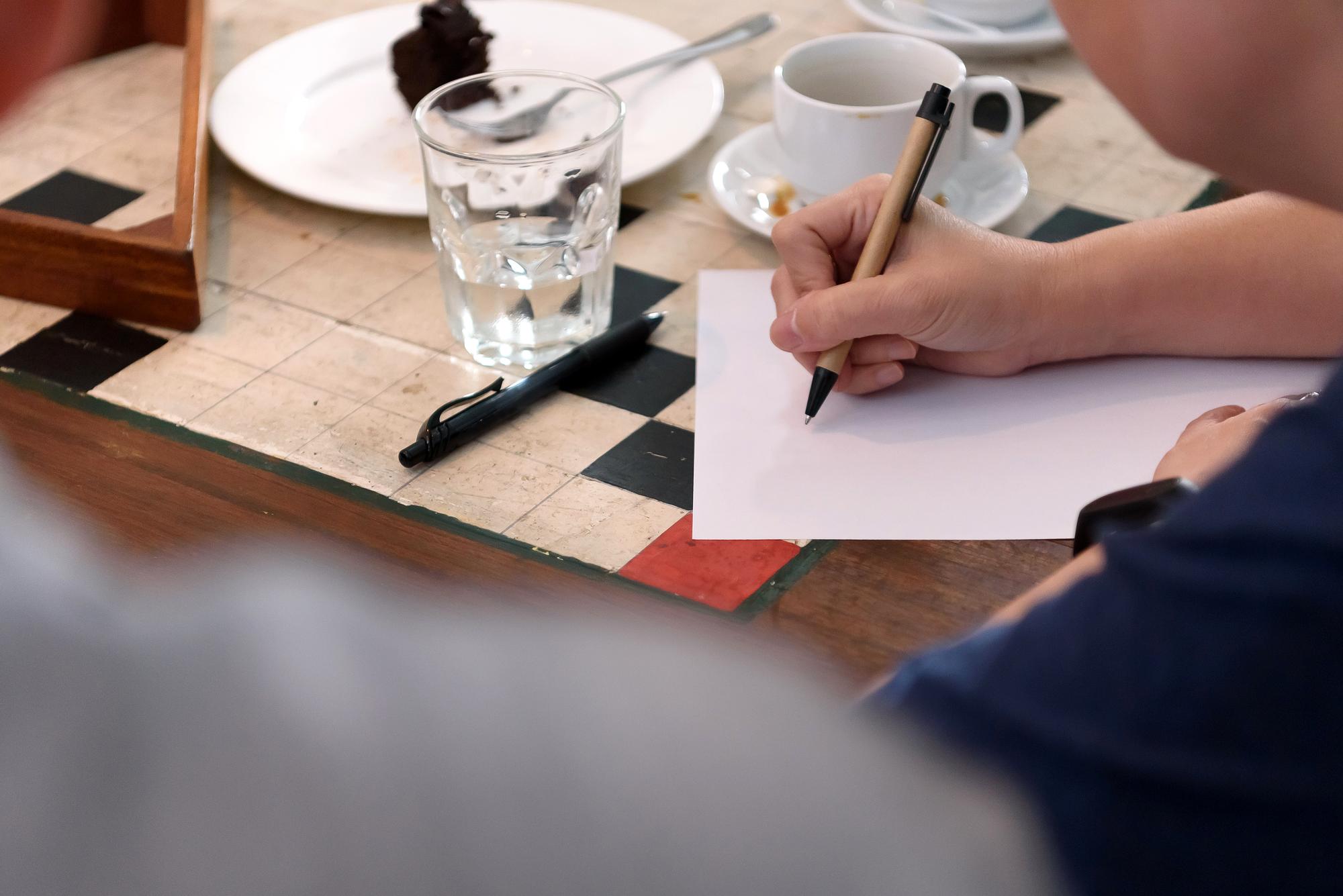Consultation table with menu drafts